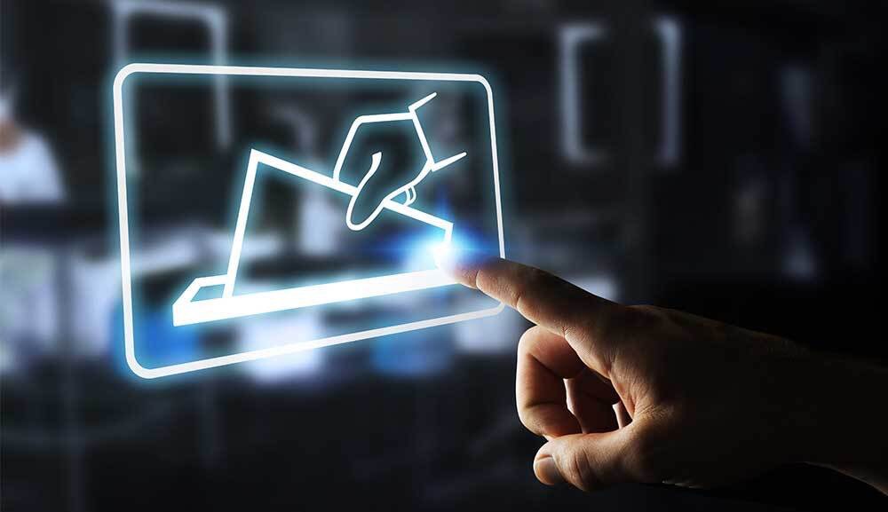 Dedo señalando una imagen virtual de una votación