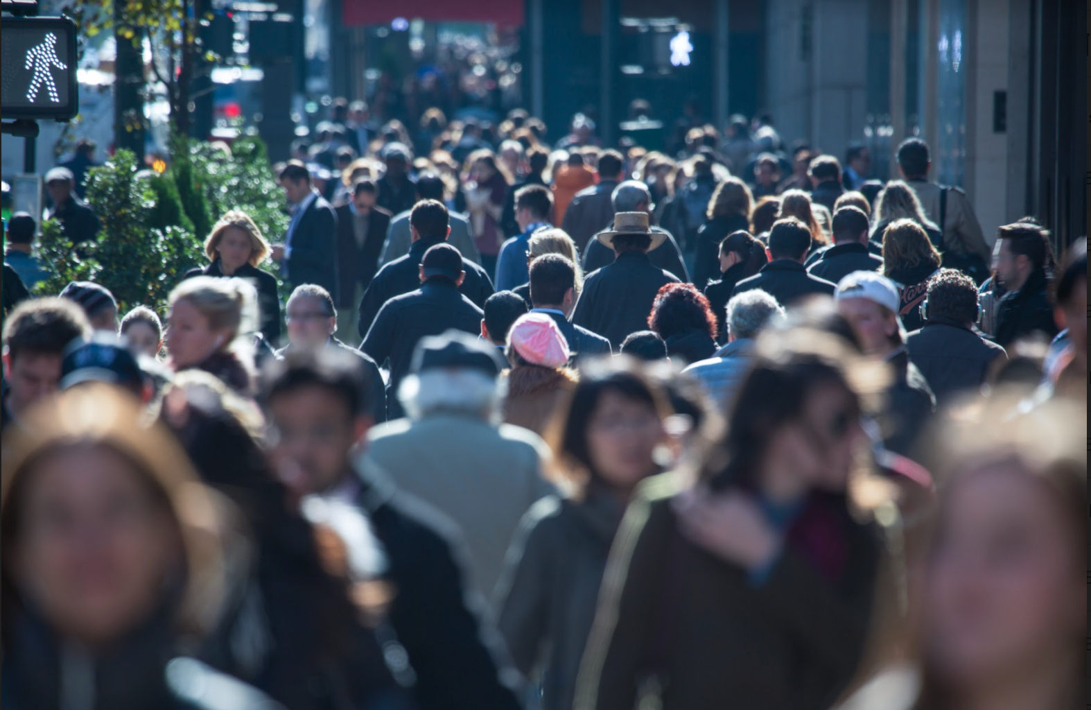 People walking down a busy street